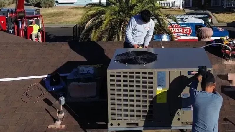 Semper techs installing AC