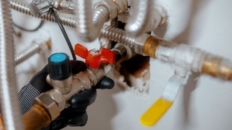 Leaking pipes underneath sink.