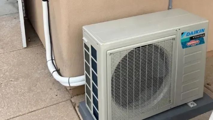 Ductless mini split installed to exterior mall.