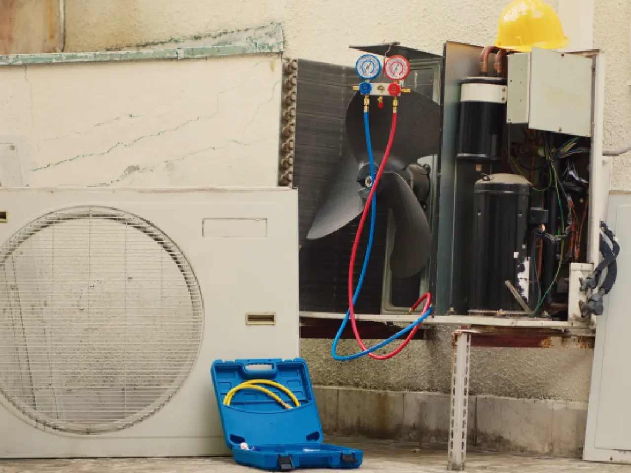 Technician repairing air conditioner
